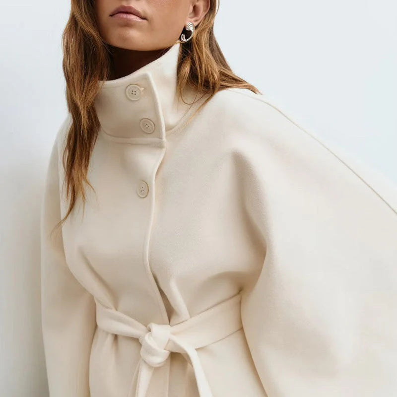 Women's cape-style coat with stand-up collar and belt